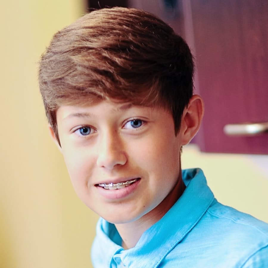 kid smiling with brace